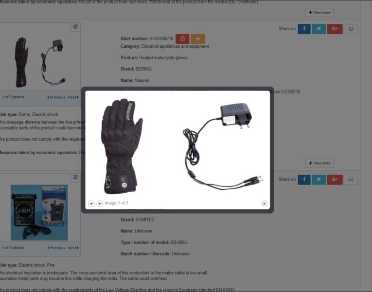 black glove next to cord with outlet plug and jacks