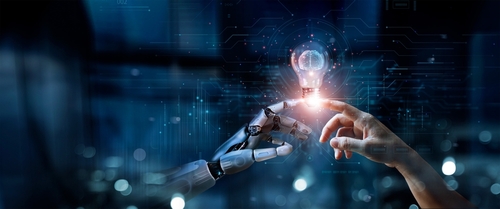 Human hand and robot hand touch fingers